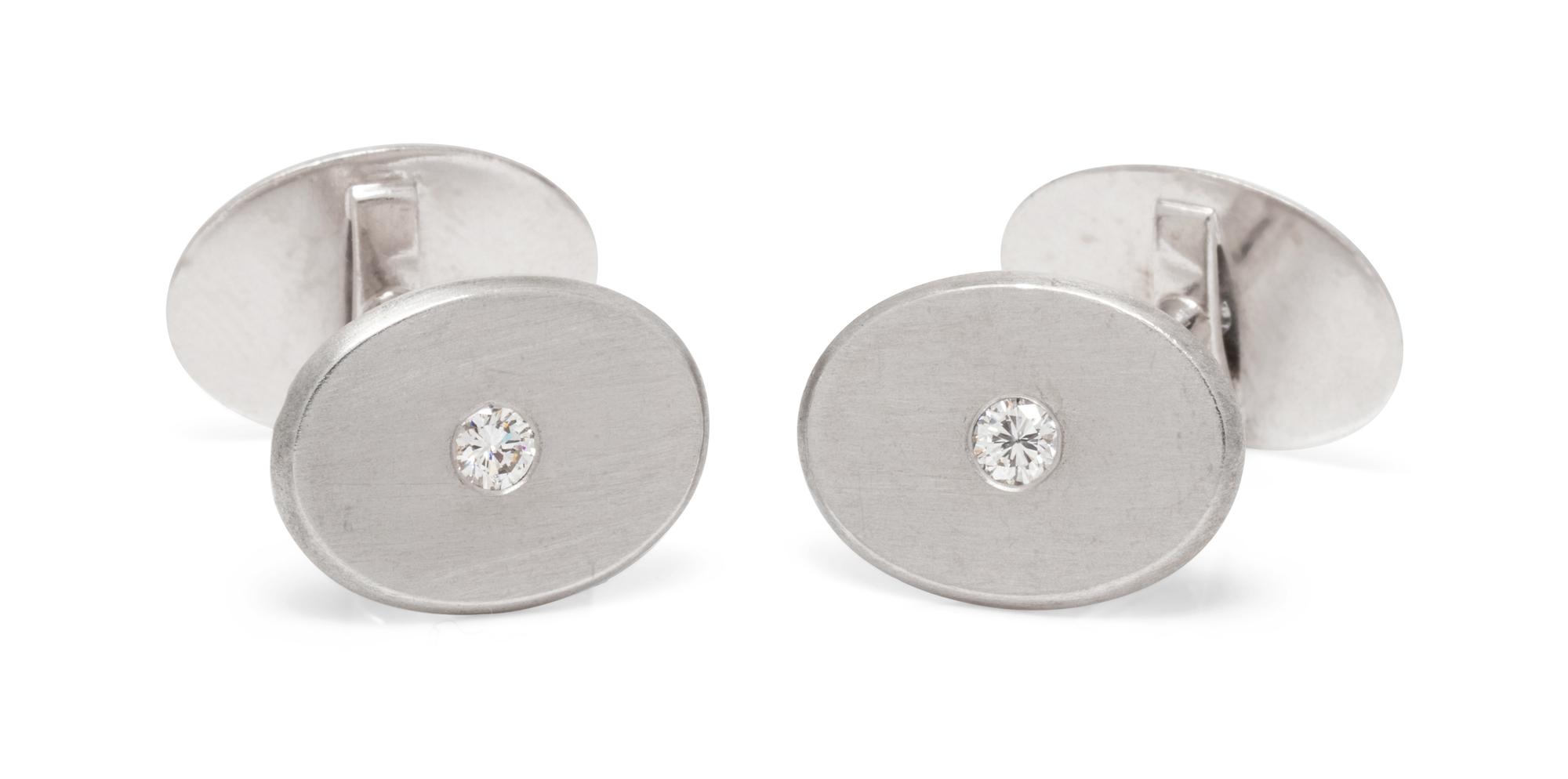 A Pair of Platinum and Diamond Cufflinks,