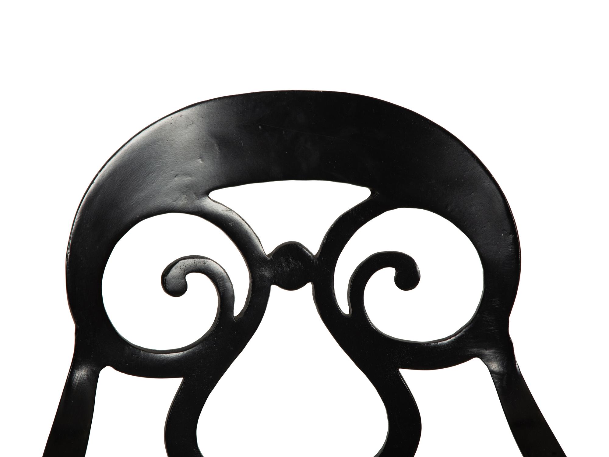A Pair of Black Painted Metal Armchairs