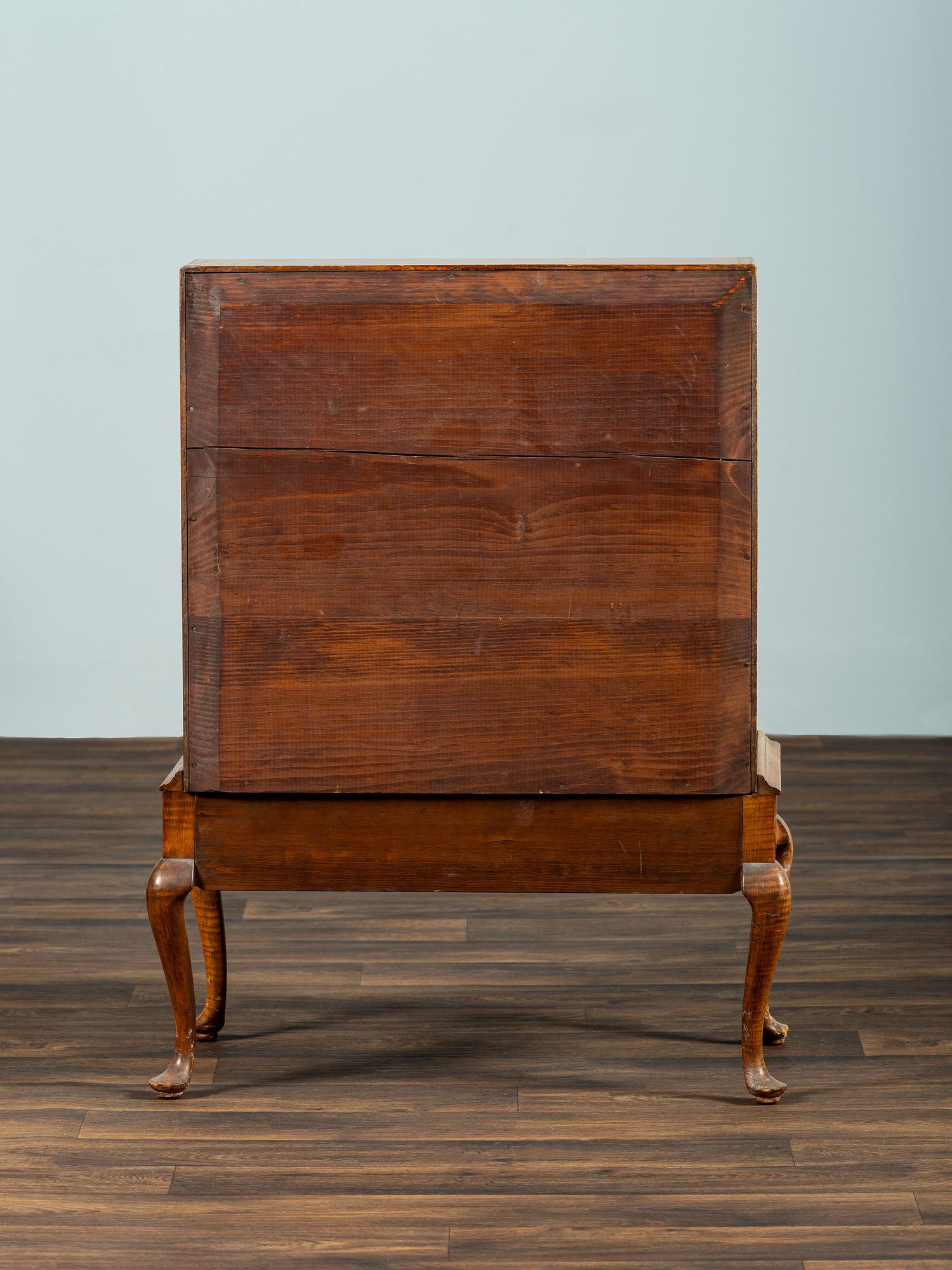 A Diminutive Queen Anne Style Tiger Maple Desk on Stand