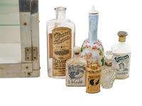 An Oak Shaving Stand and Emil J. Paidar Company Counter-Top Apothecary Cabinet