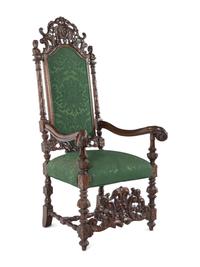 A William and Mary Style Carved Walnut Armchair