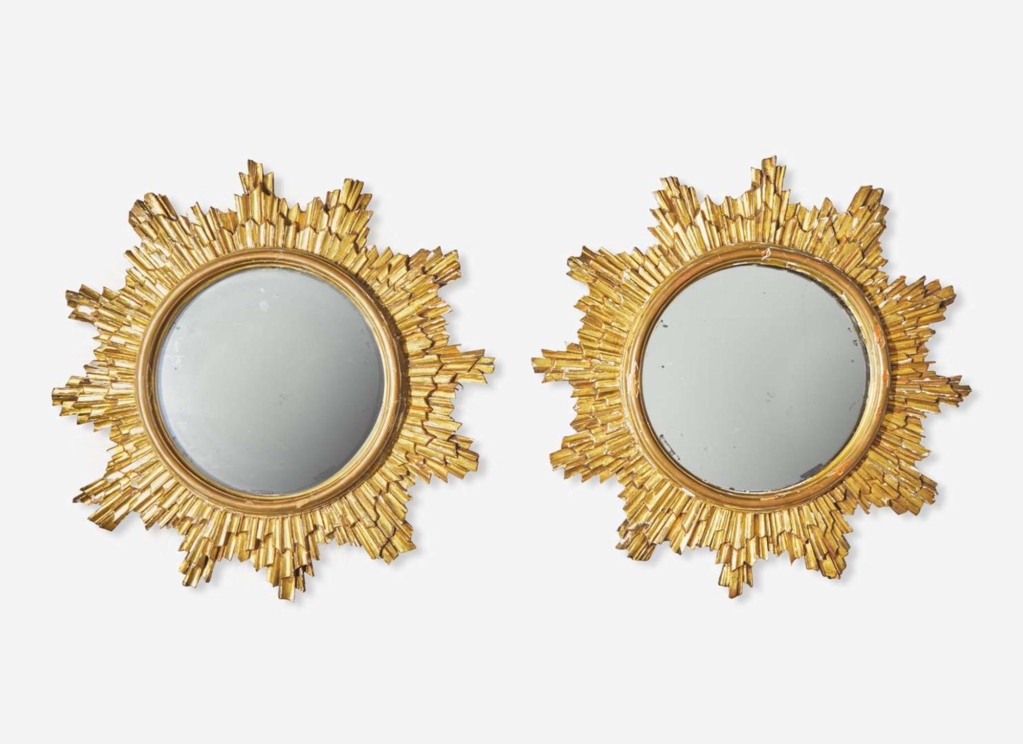 A pair of giltwood sunburst mirrors, 20th century