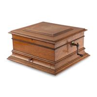 A Regina Oak Tabletop Disc Music Box