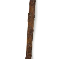 Group of seven carved wood canes with figural and patriotic motifs American and Mexican, late 19th/20th century