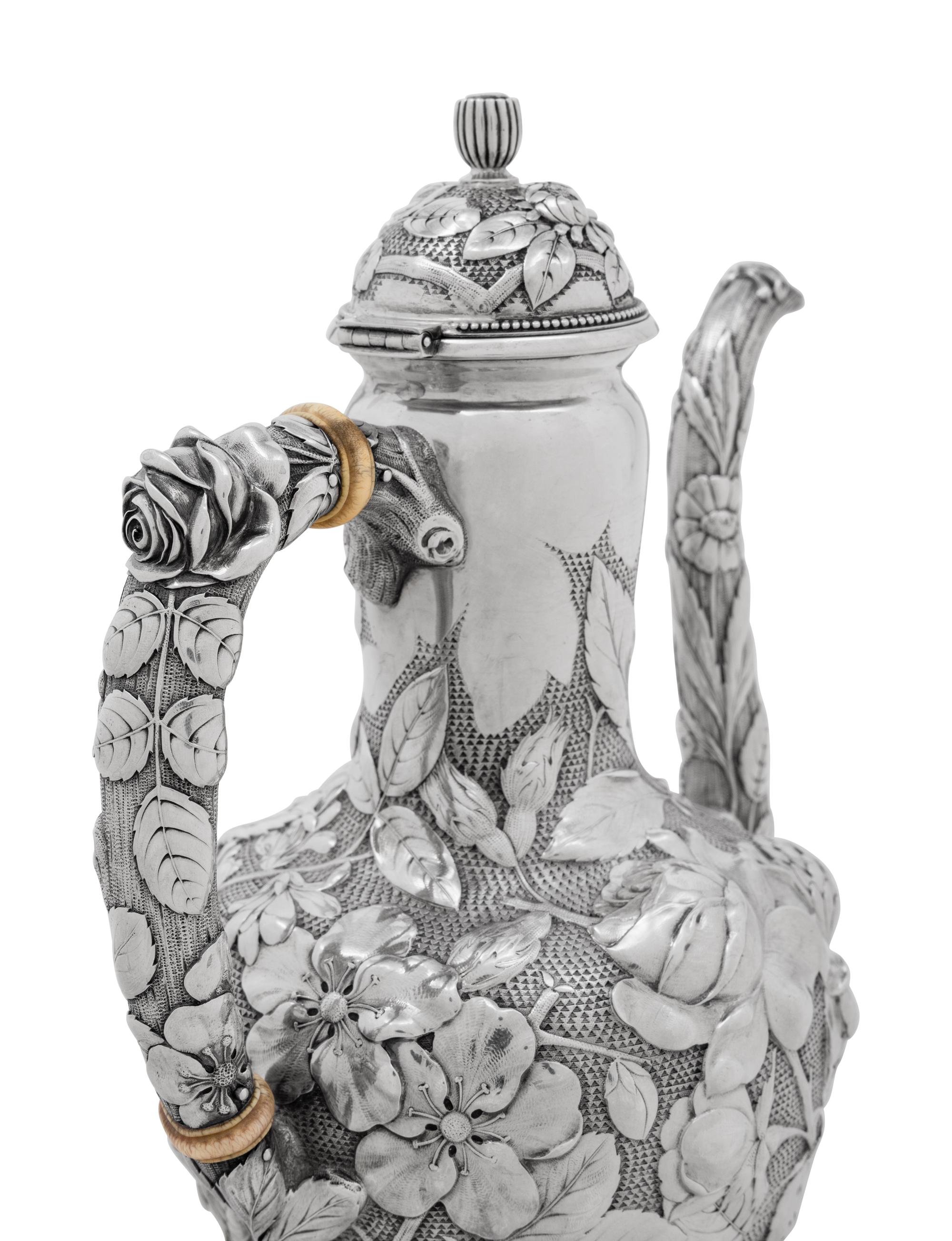 An American Silver Repoussé Five-Piece Tea and Coffee Service