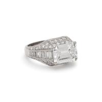 BULGARI, EMERALD CUT DIAMOND AND DIAMOND 'TROMBINO' RING
