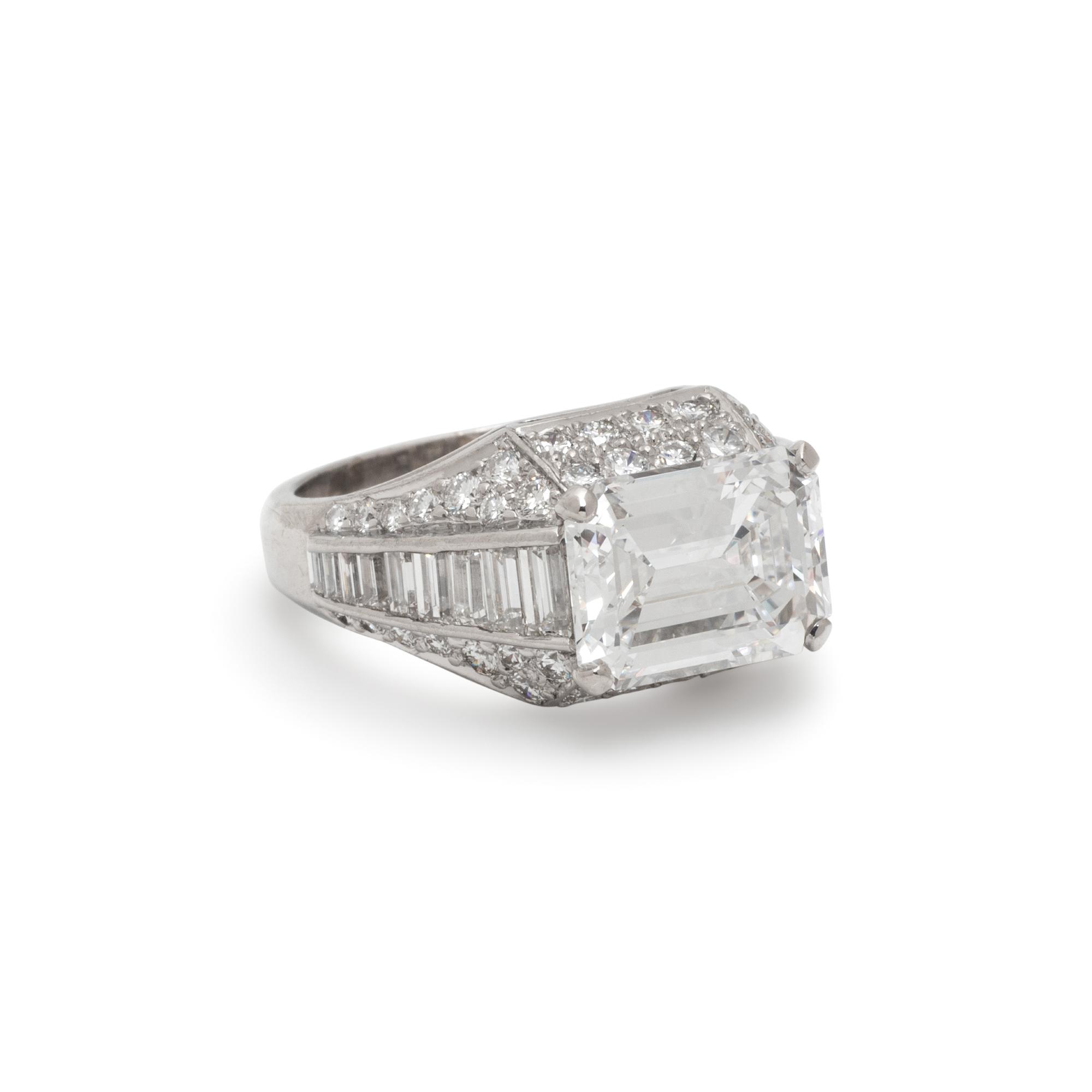 BULGARI, EMERALD CUT DIAMOND AND DIAMOND 'TROMBINO' RING