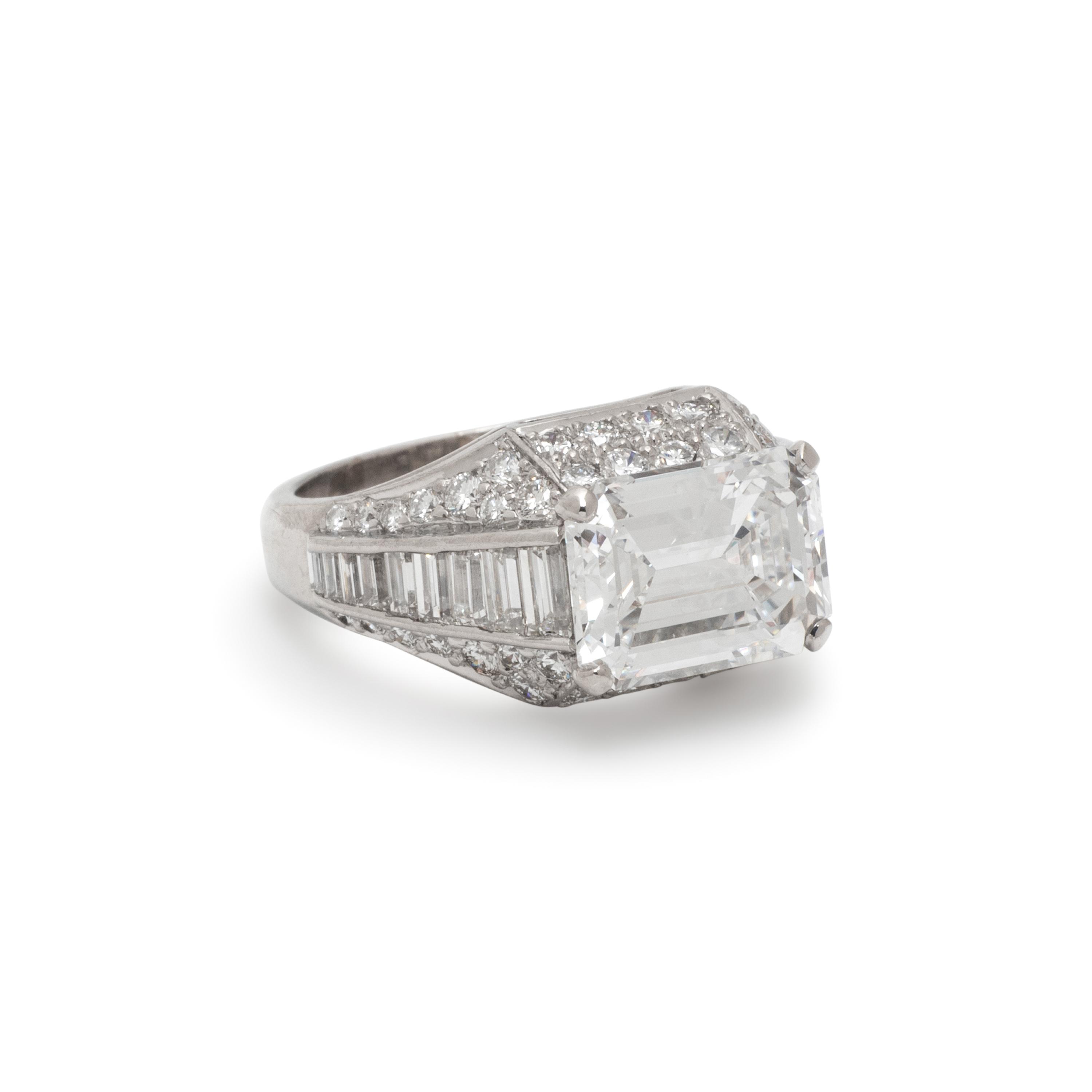 BULGARI, EMERALD CUT DIAMOND AND DIAMOND 'TROMBINO' RING