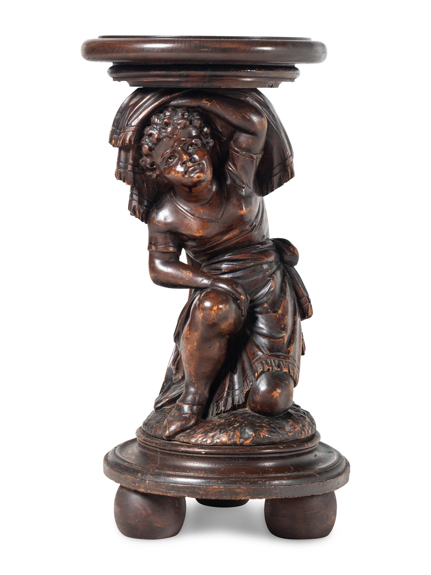 A Venetian Carved Walnut Figural Pedestal