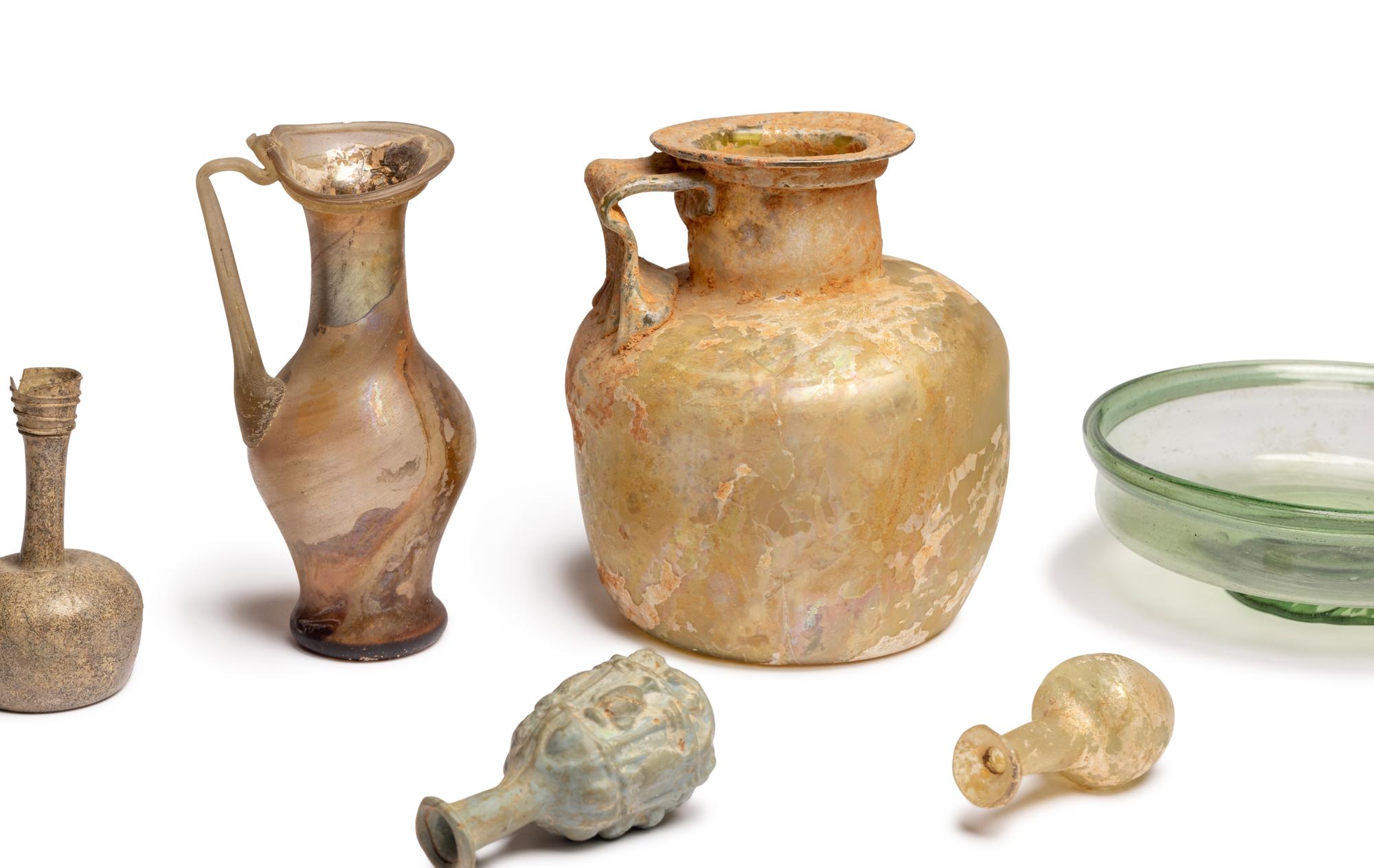 A Group of Nine Roman, Sidonian, and Islamic Glass Vessels