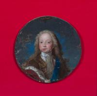 A Pair of Framed Portrait Fragments Diameter of each 9 inches.