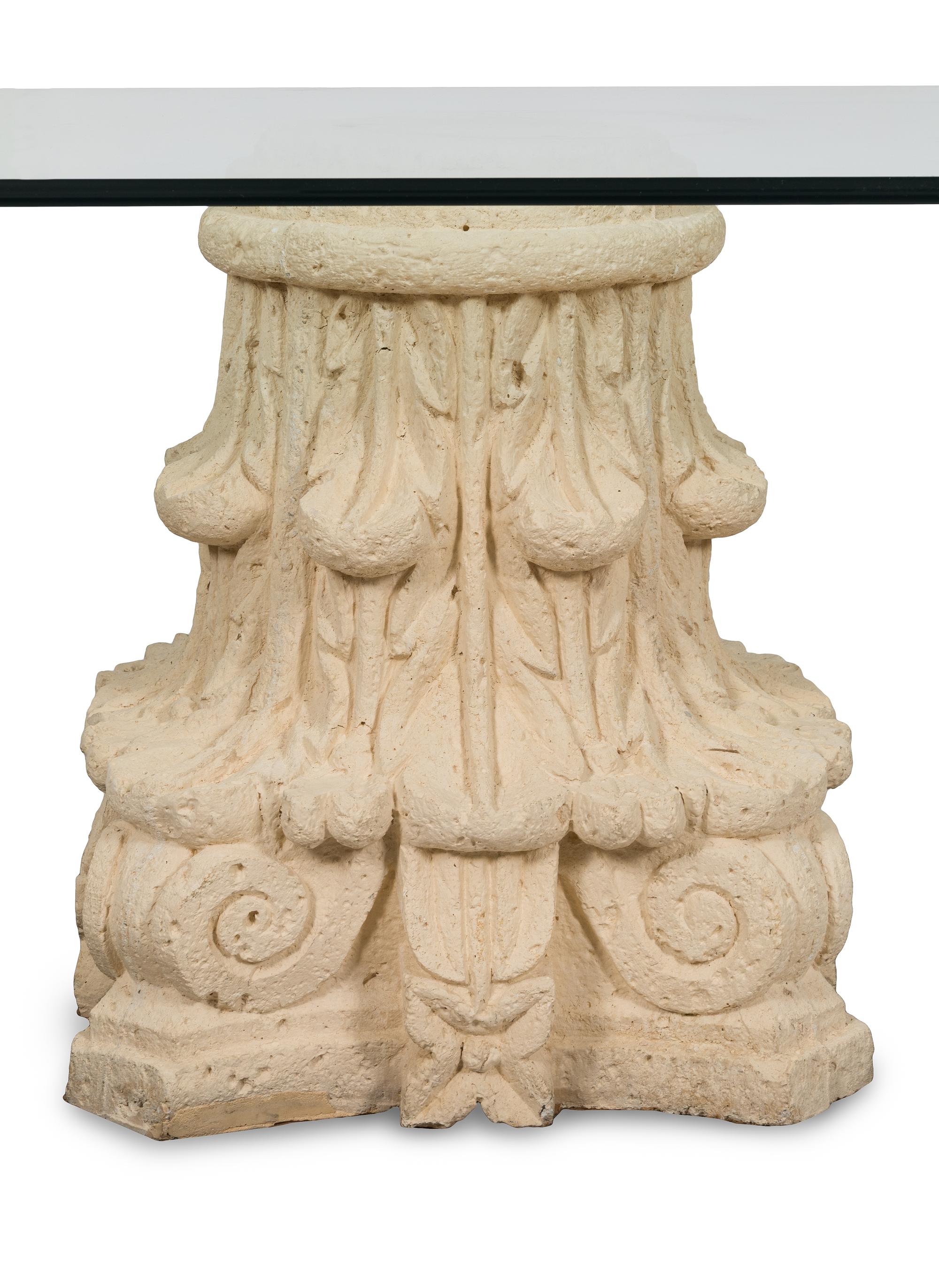A Glass-Top Dining Table with Dual Composition Pedestal Base
