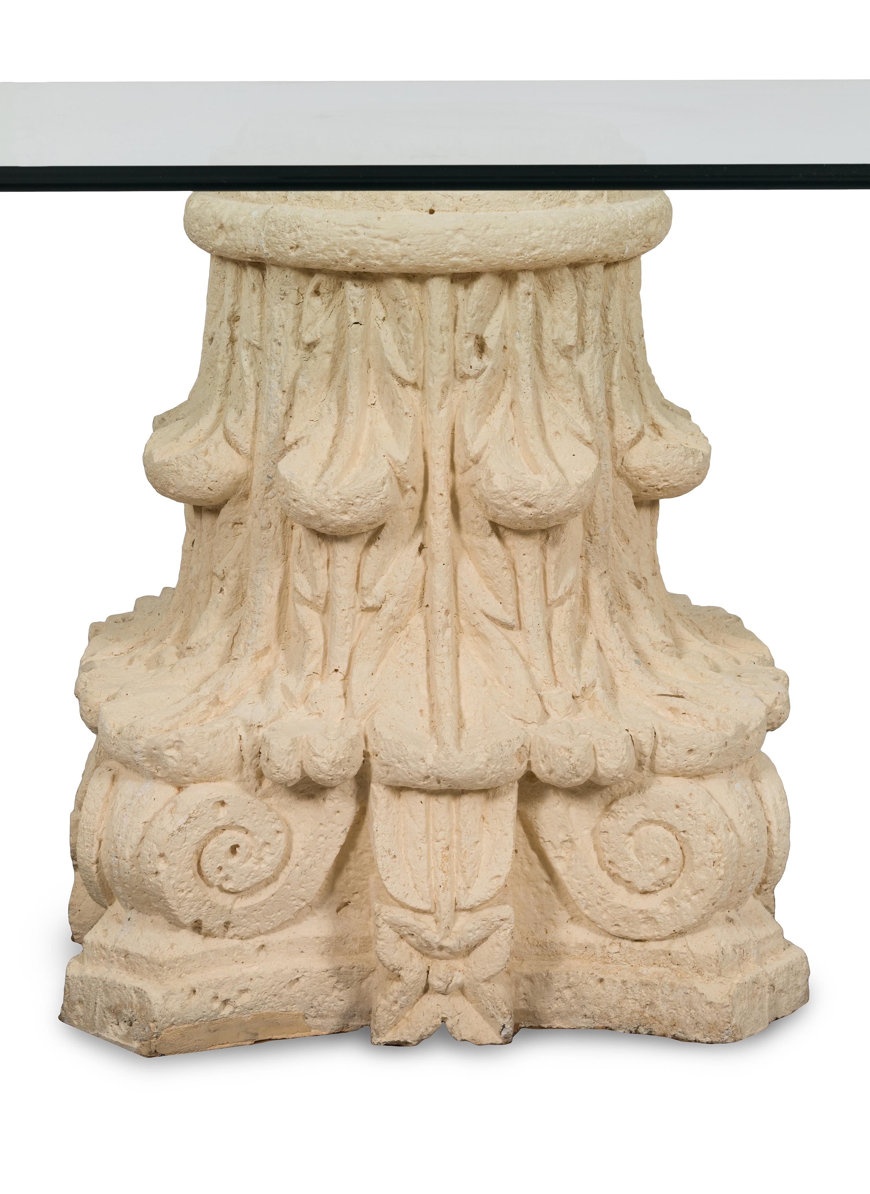 A Glass-Top Dining Table with Dual Composition Pedestal Base