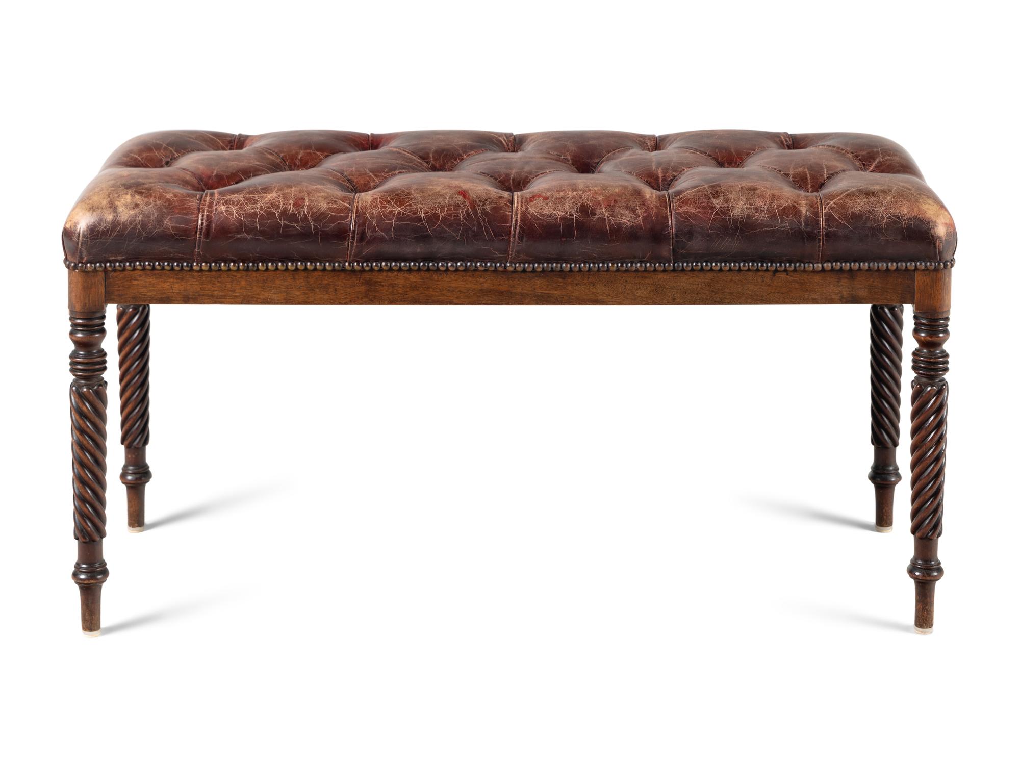 A Button-Tufted Leather Upholstered Bench