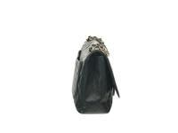Chanel Maxi Flap Bag in Caviar Leather