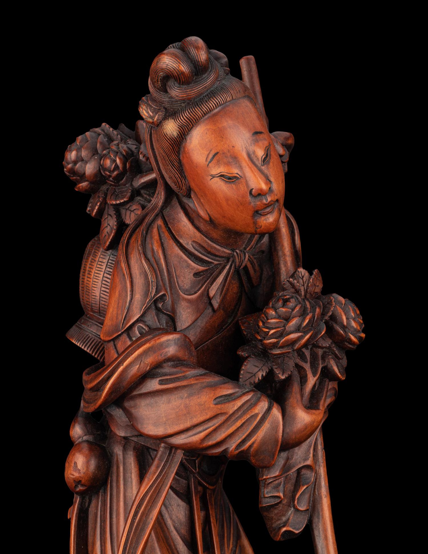 A Chinese Boxwood Figure of a Female Immortal