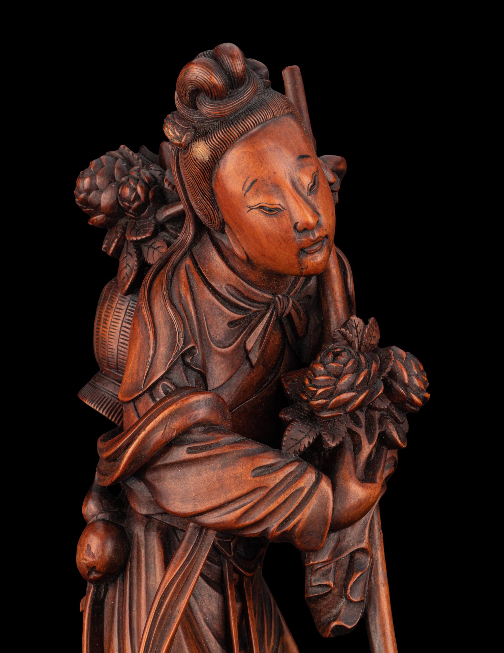 A Chinese Boxwood Figure of a Female Immortal