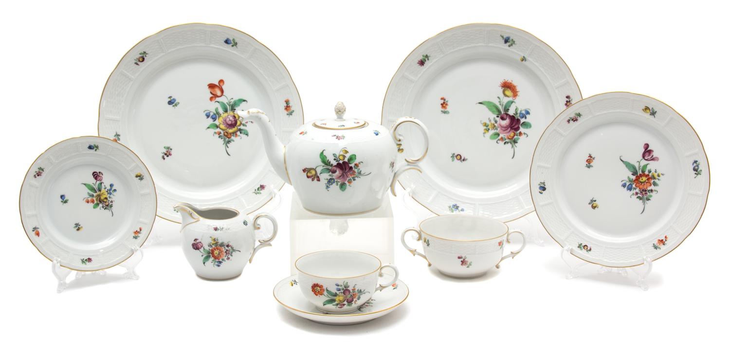 A Nymphenburg Porcelain Partial Dinner Service Diameter of first 10 3/8 inches. — 20TH CENTURY