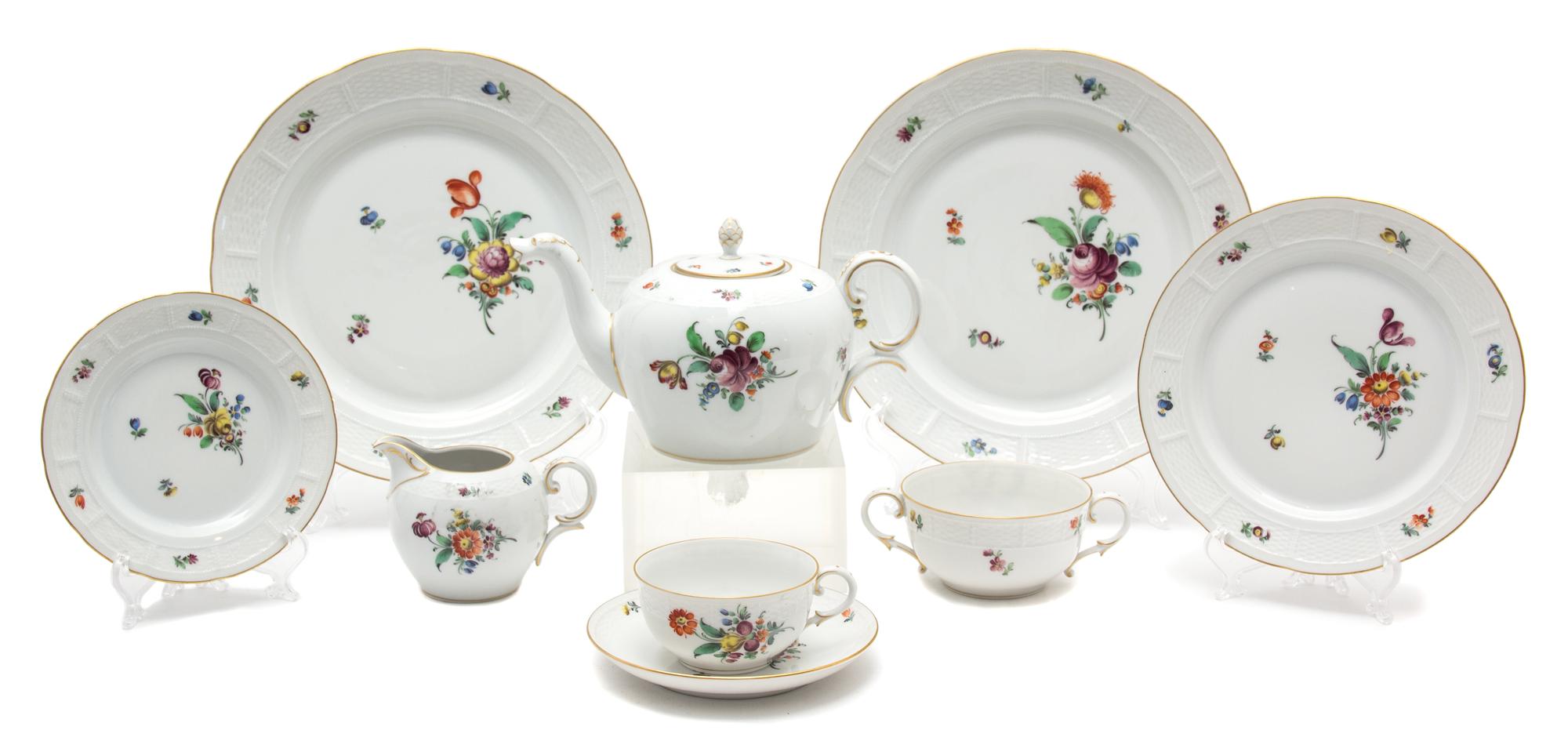 A Nymphenburg Porcelain Partial Dinner Service Diameter of first 10 3/8 inches. — 20TH CENTURY