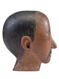 A Folk Art Carved and Painted Pine Carnival Head