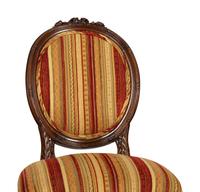Four Louis XVI Style Carved Walnut Chairs