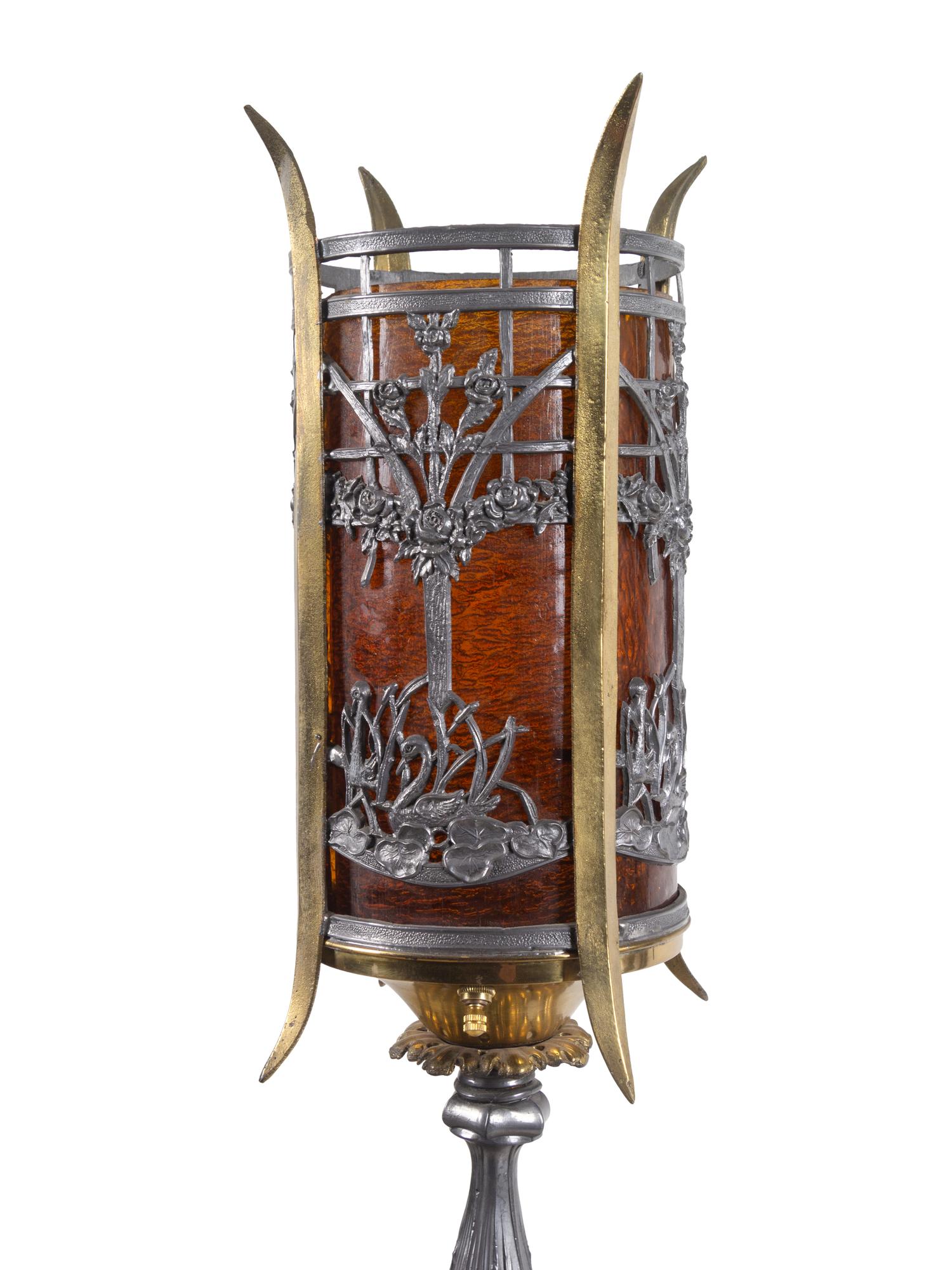 A Pair of Iron and Brass Floor Lamps