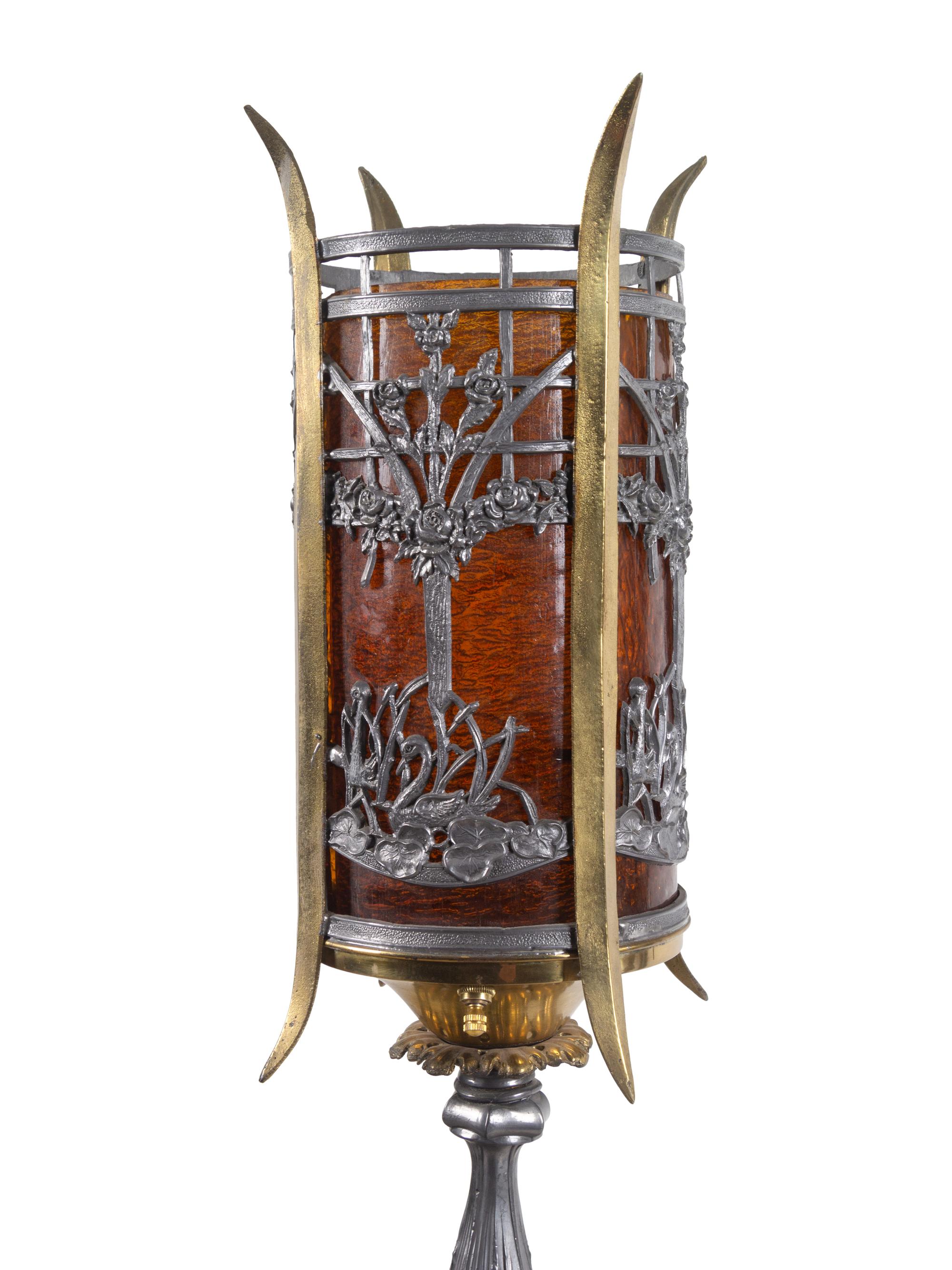 A Pair of Iron and Brass Floor Lamps