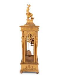 An Empire Gilt Bronze Figural Mantel Clock