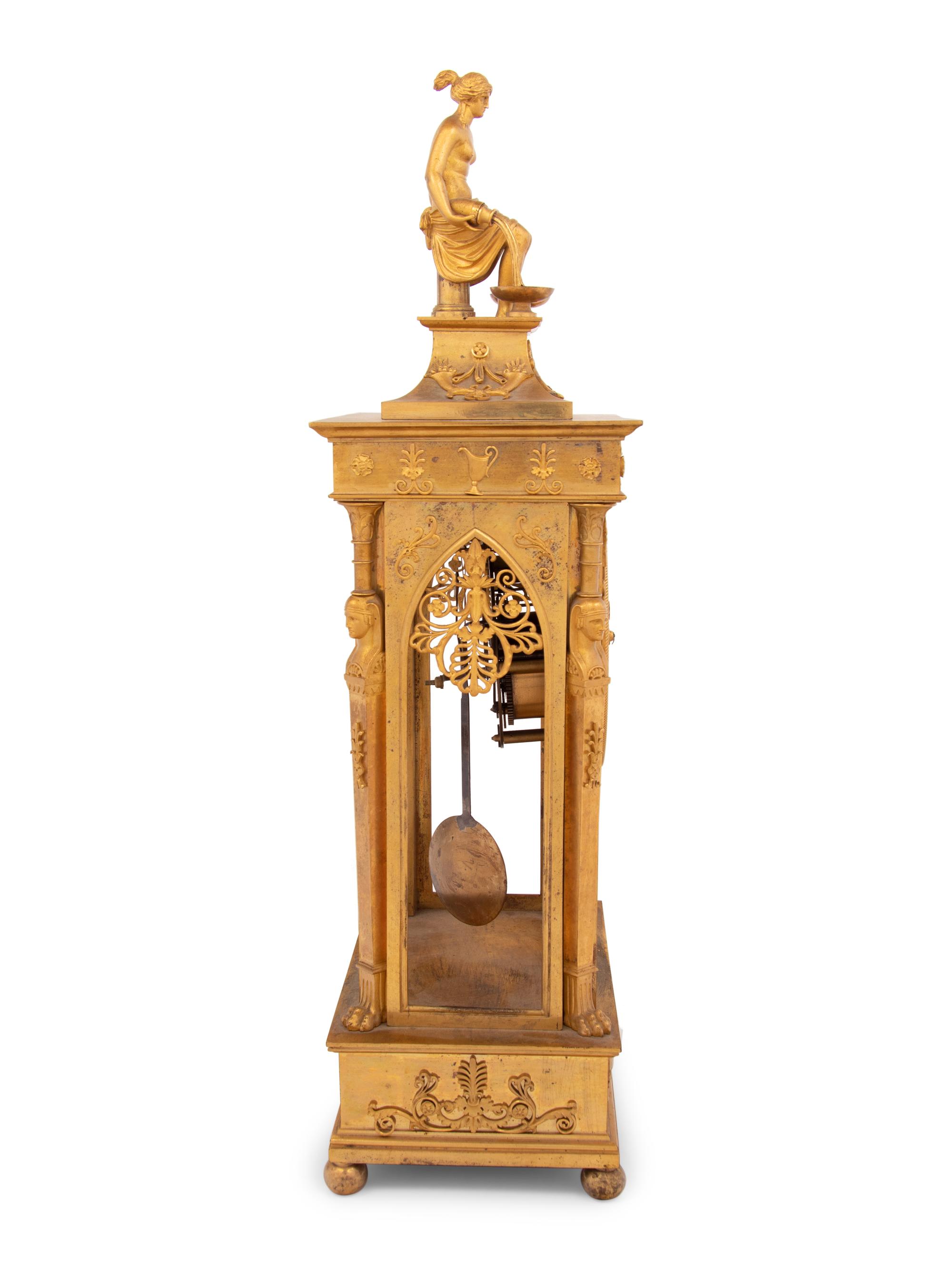 An Empire Gilt Bronze Figural Mantel Clock