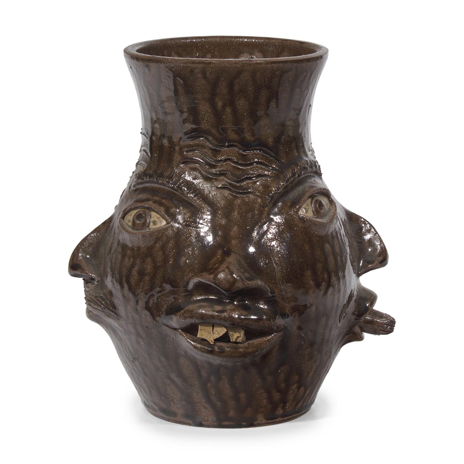 Charlie West, A Glazed Stoneware Work: Four-Sided Face Jug