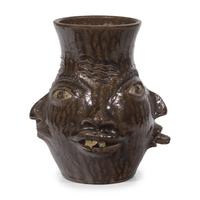 Charlie West, A Glazed Stoneware Work: Four-Sided Face Jug