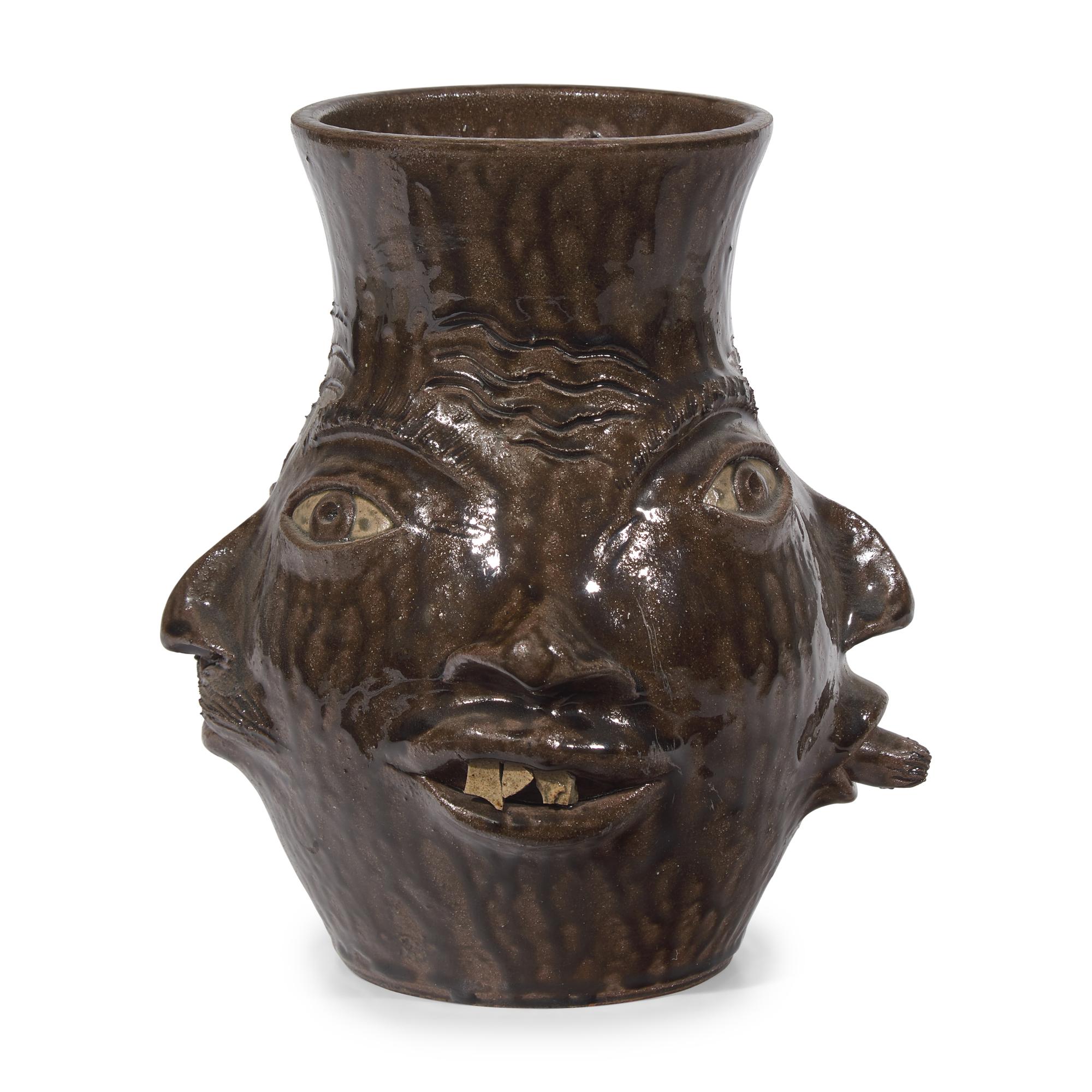 Charlie West, A Glazed Stoneware Work: Four-Sided Face Jug