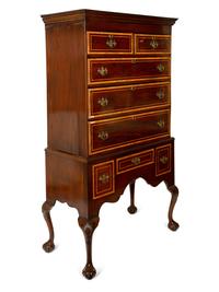 A Queen Anne Style Mahogany and Satinwood High Chest
