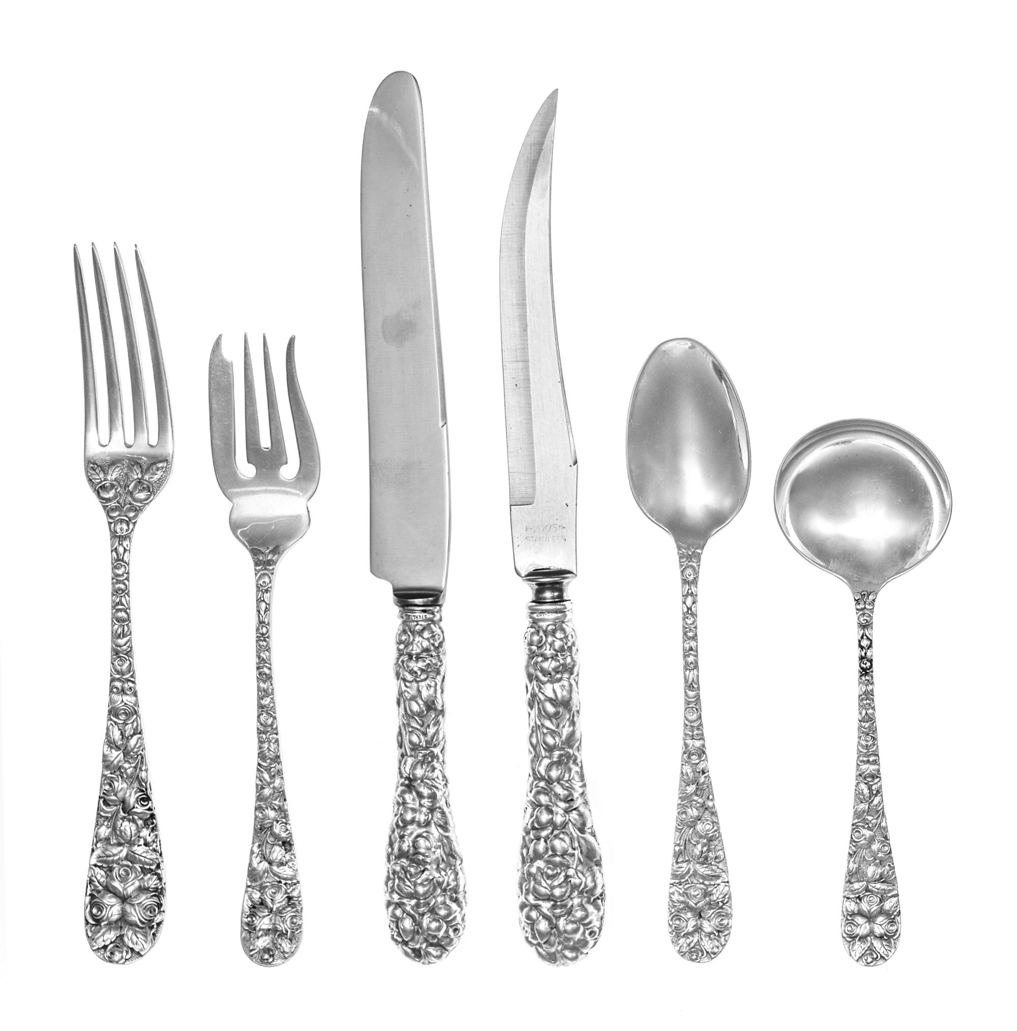 An American Silver Flatware Service, The Schofield Co., Baltimore, MD, Baltimore Rose pattern, comprising: 12 dinner knives 12 luncheon