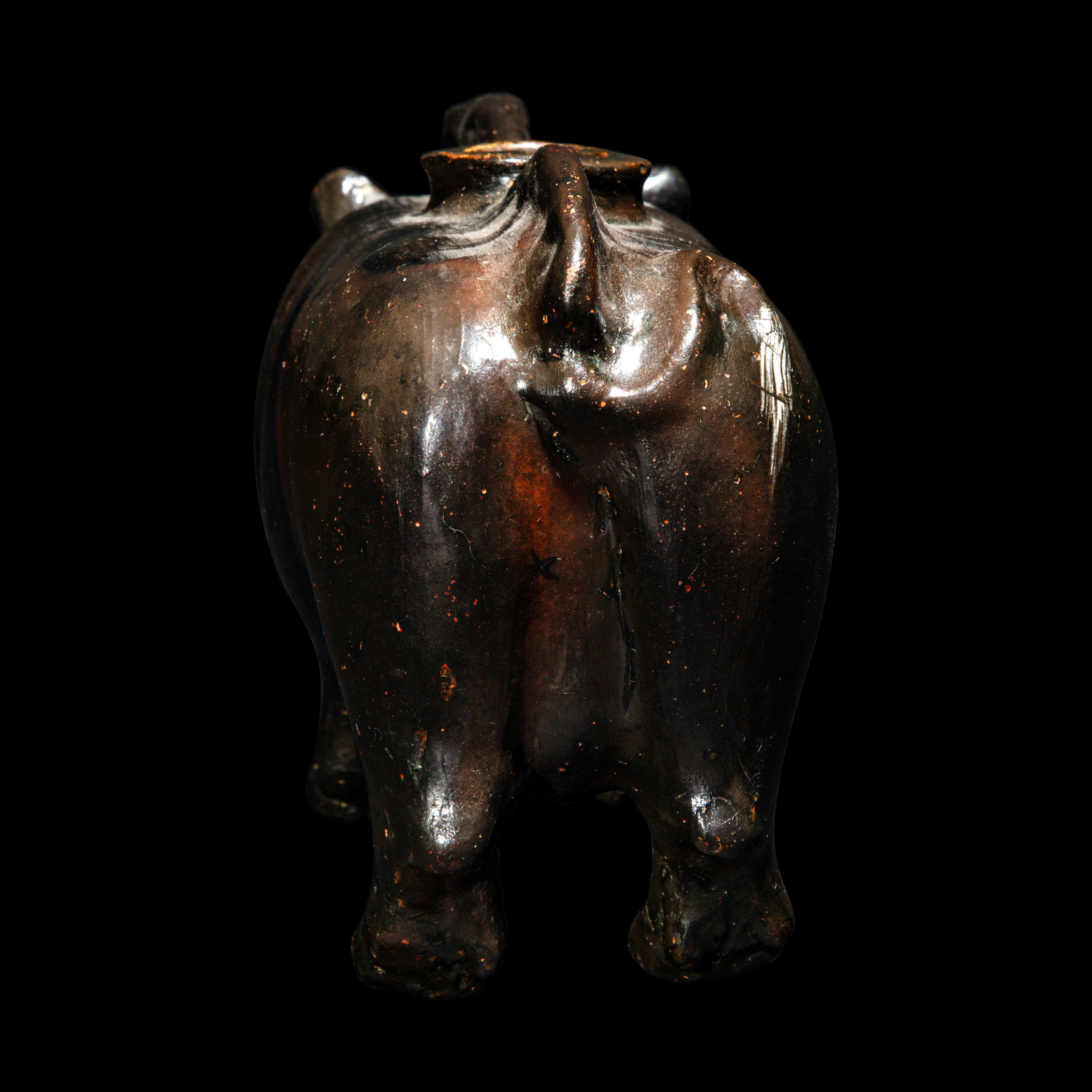 A South Italian Black-Glazed Askos in the form of a Boar