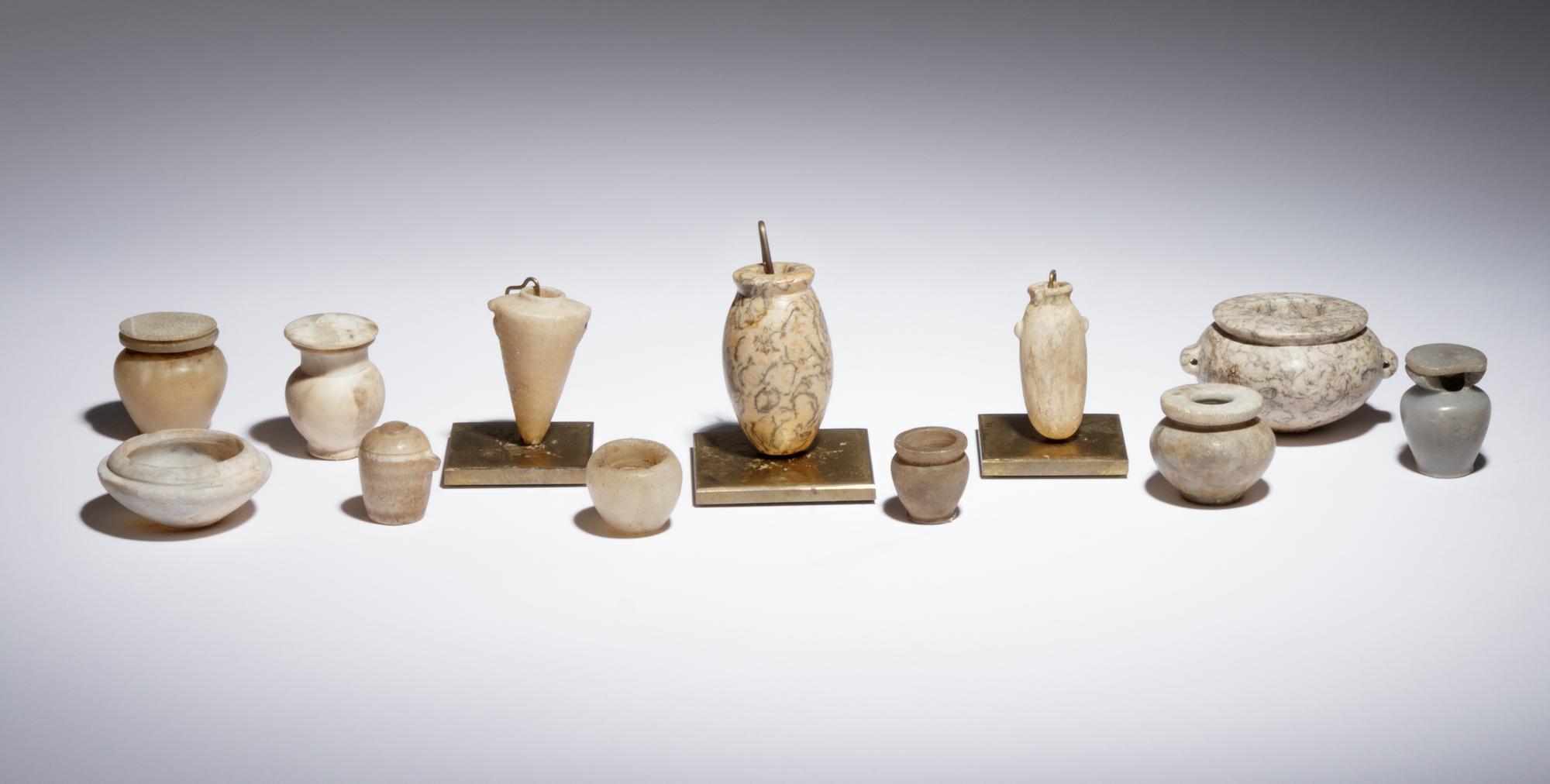 Twelve Egyptian Alabaster, Breccia and Other Stone Vessels