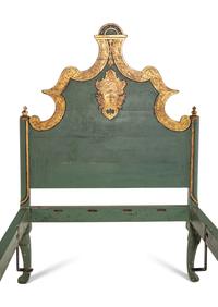 A Pair of Venetian Style Painted and Parcel Gilt Twin Beds