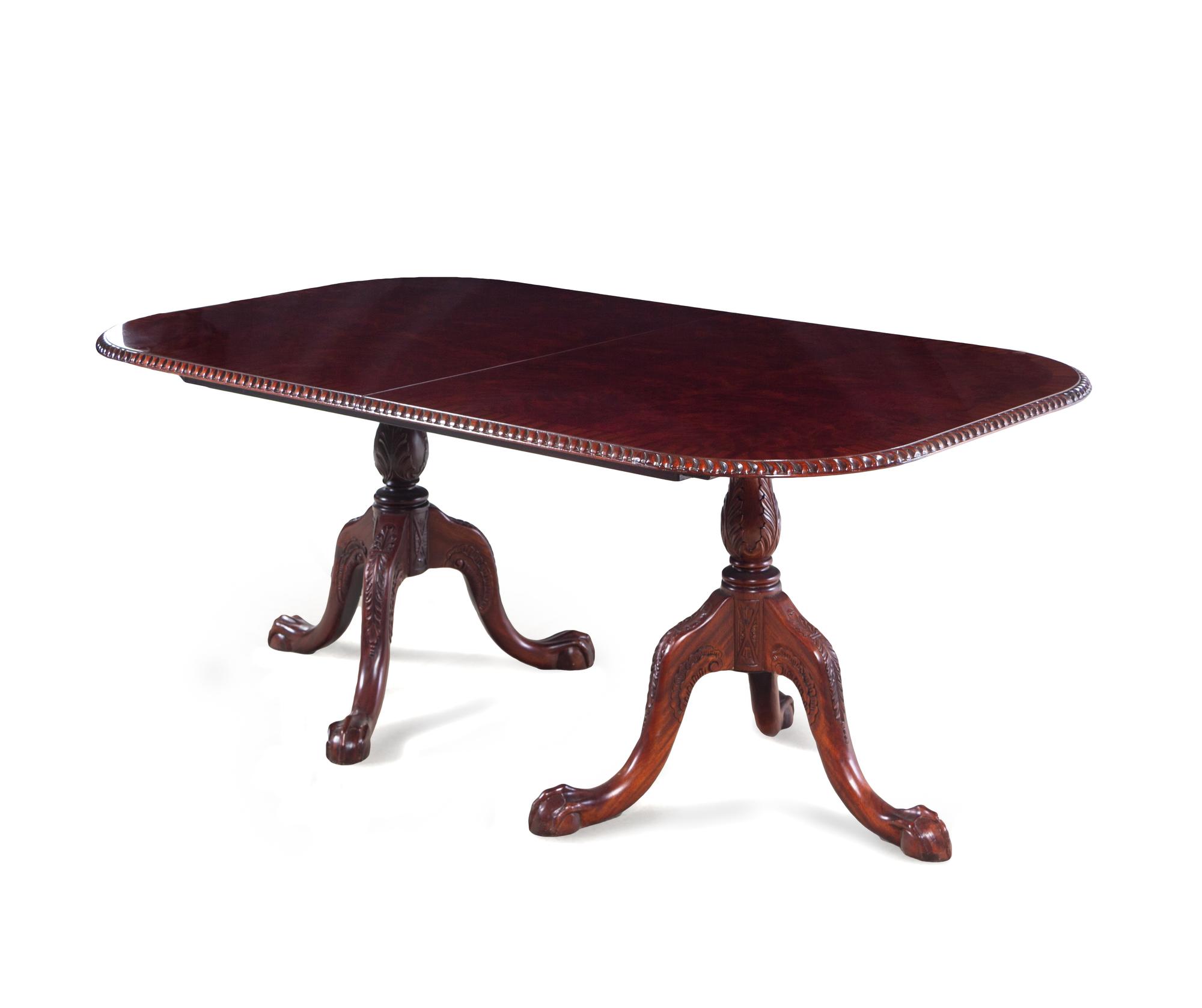 A Queen Anne Style Mahogany Double-Pedestal Dining Table