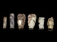 Six Chinese Celadon Jade Figures