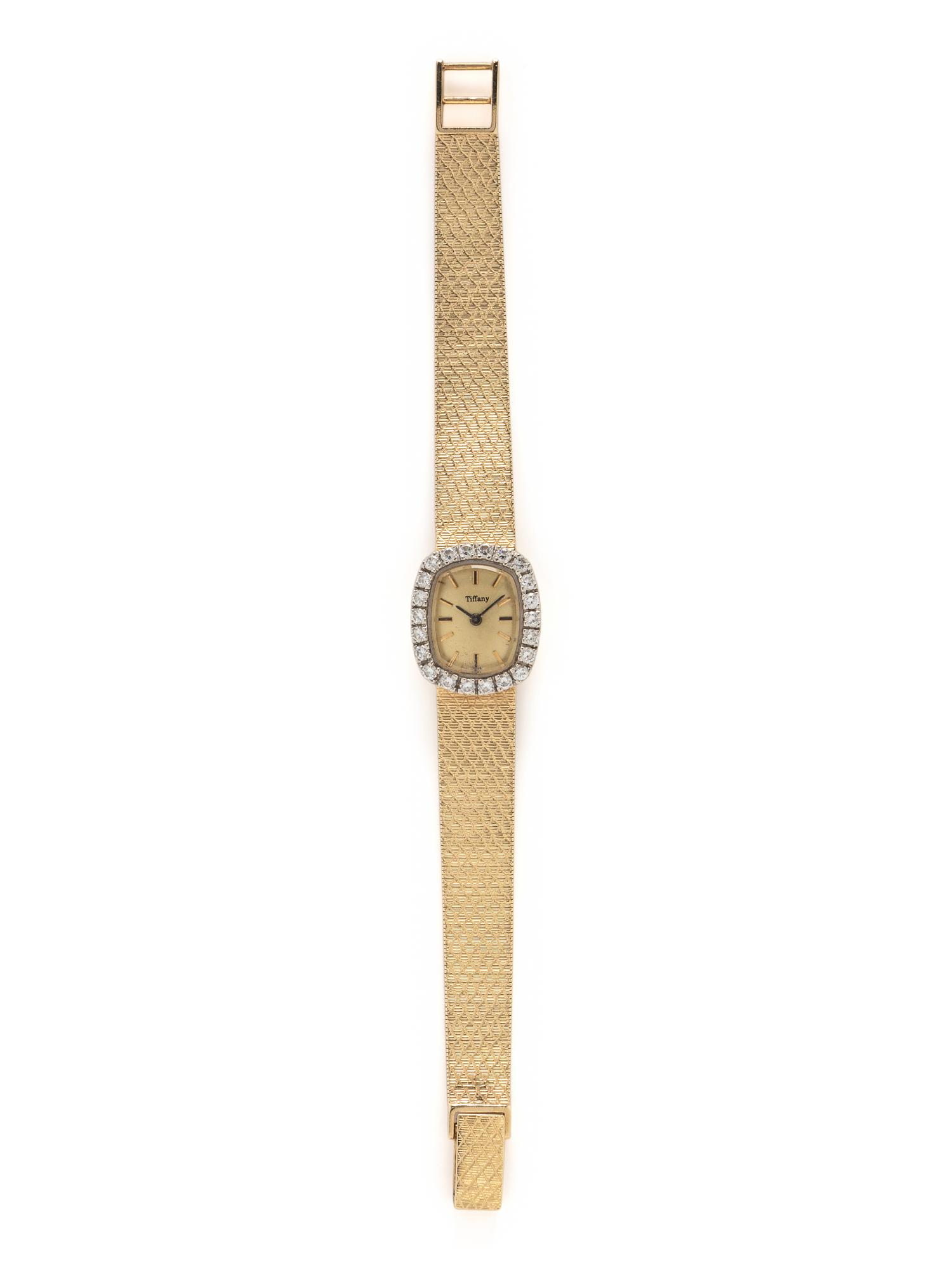 YELLOW GOLD AND DIAMOND WATCH