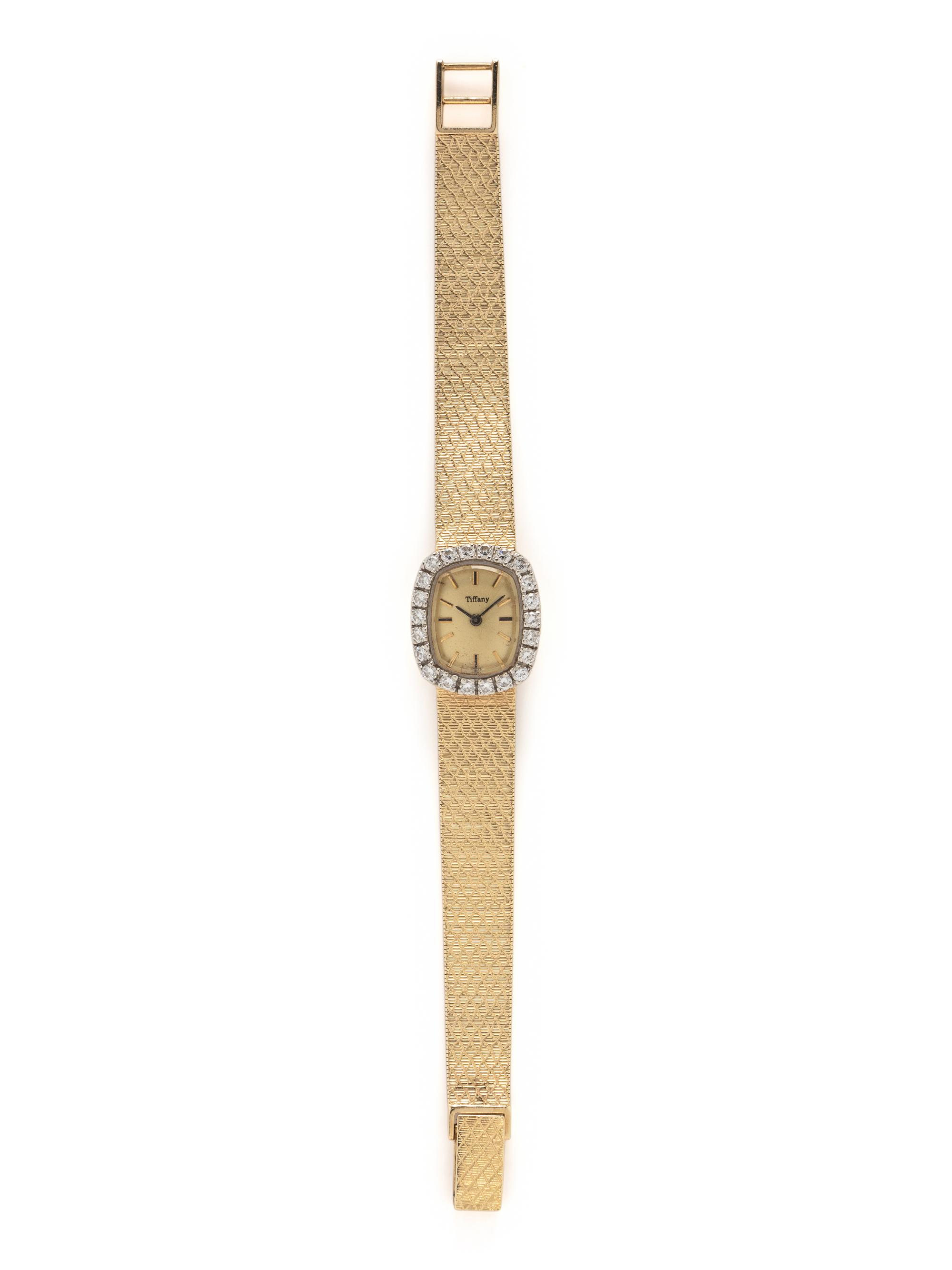 YELLOW GOLD AND DIAMOND WATCH
