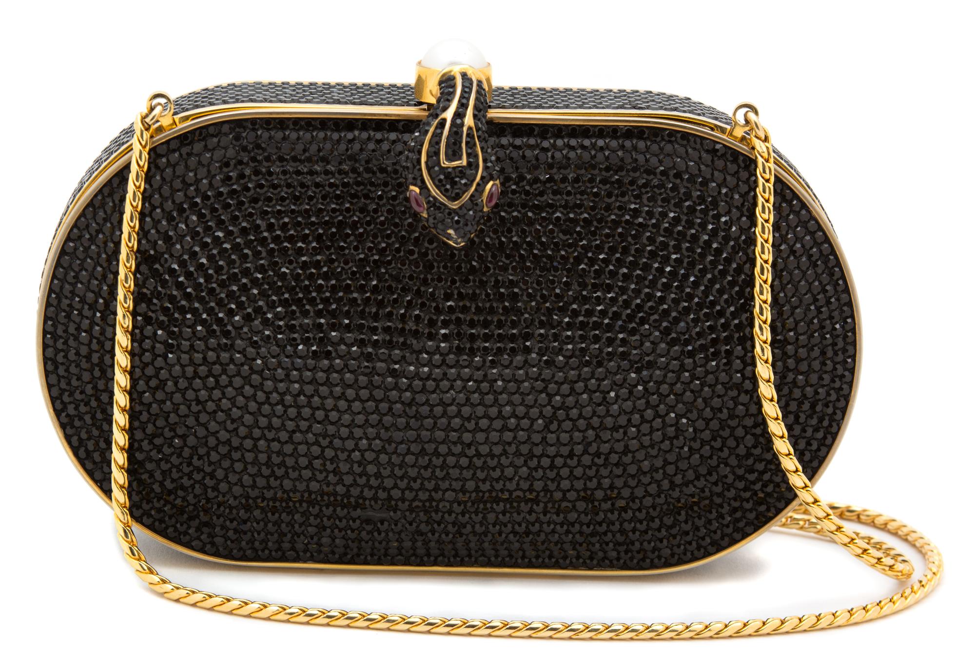 A Judith Leiber Black Crystal Minaudiere, 7" x 4" x 1.5".