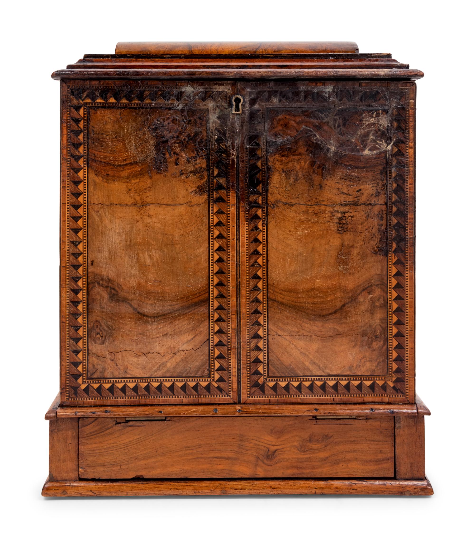 A Regency Rosewood and Parquetry Fall-Front Table Cabinet