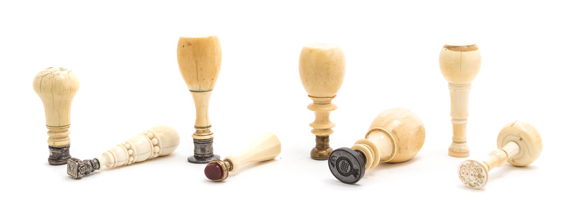 A Collection of Turned Ivory Seals, Height of tallest 4 1/4 inches.