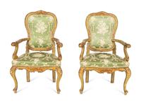 A Pair of Italian Painted and Parcel Gilt Open Armchairs