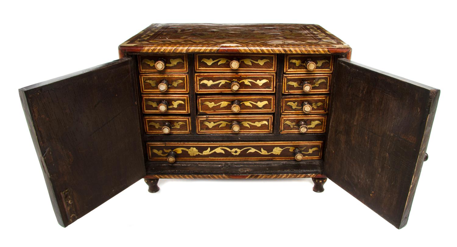 A Continental Gilt Metal and Mother-of-Pearl Inlaid Mahogany Jewelry Chest, Height 11 x width 14 1/4 x depth 9 3/4 inches.