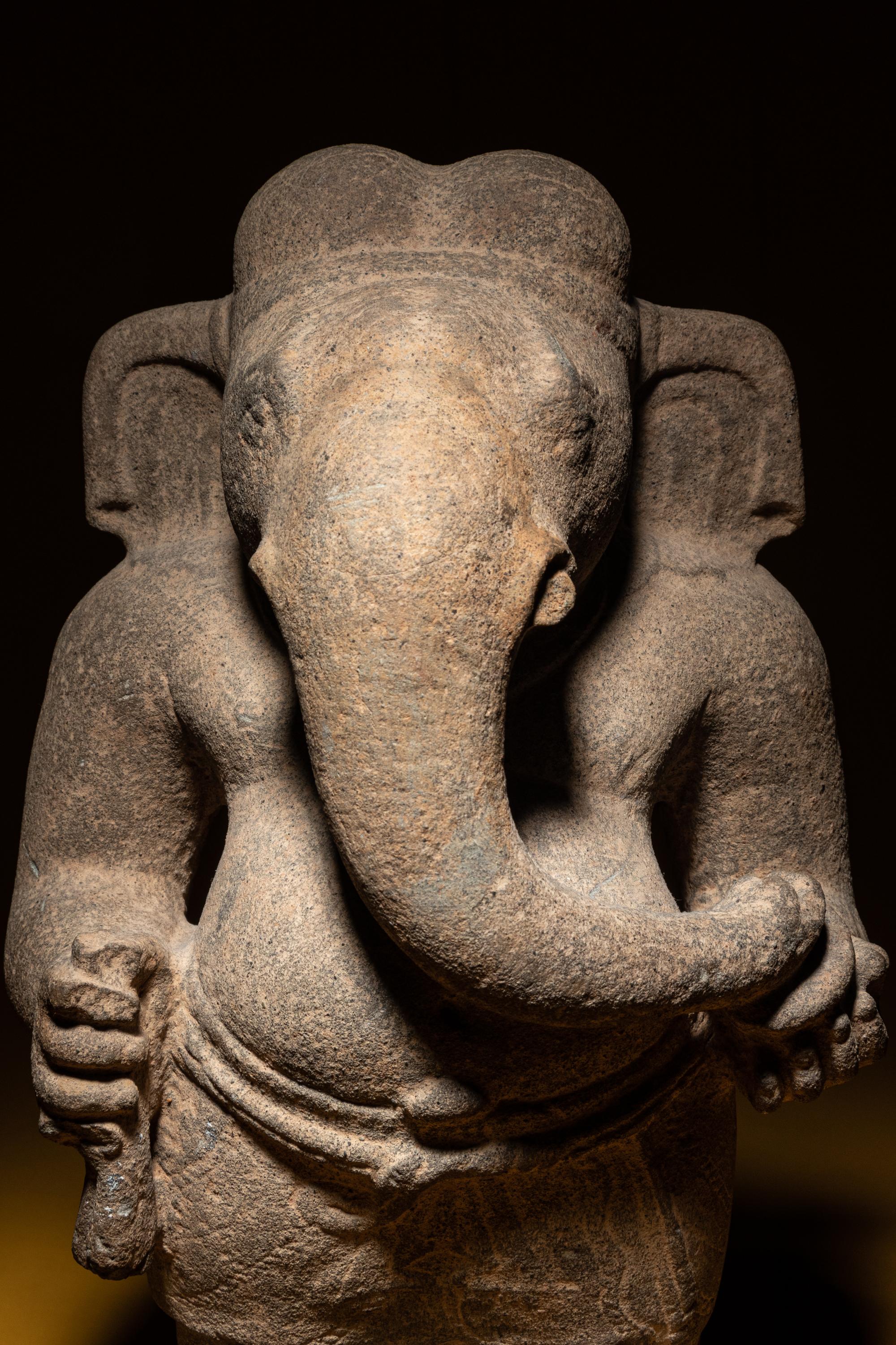 A Rare Khmer Sandstone Figure of Ganesha