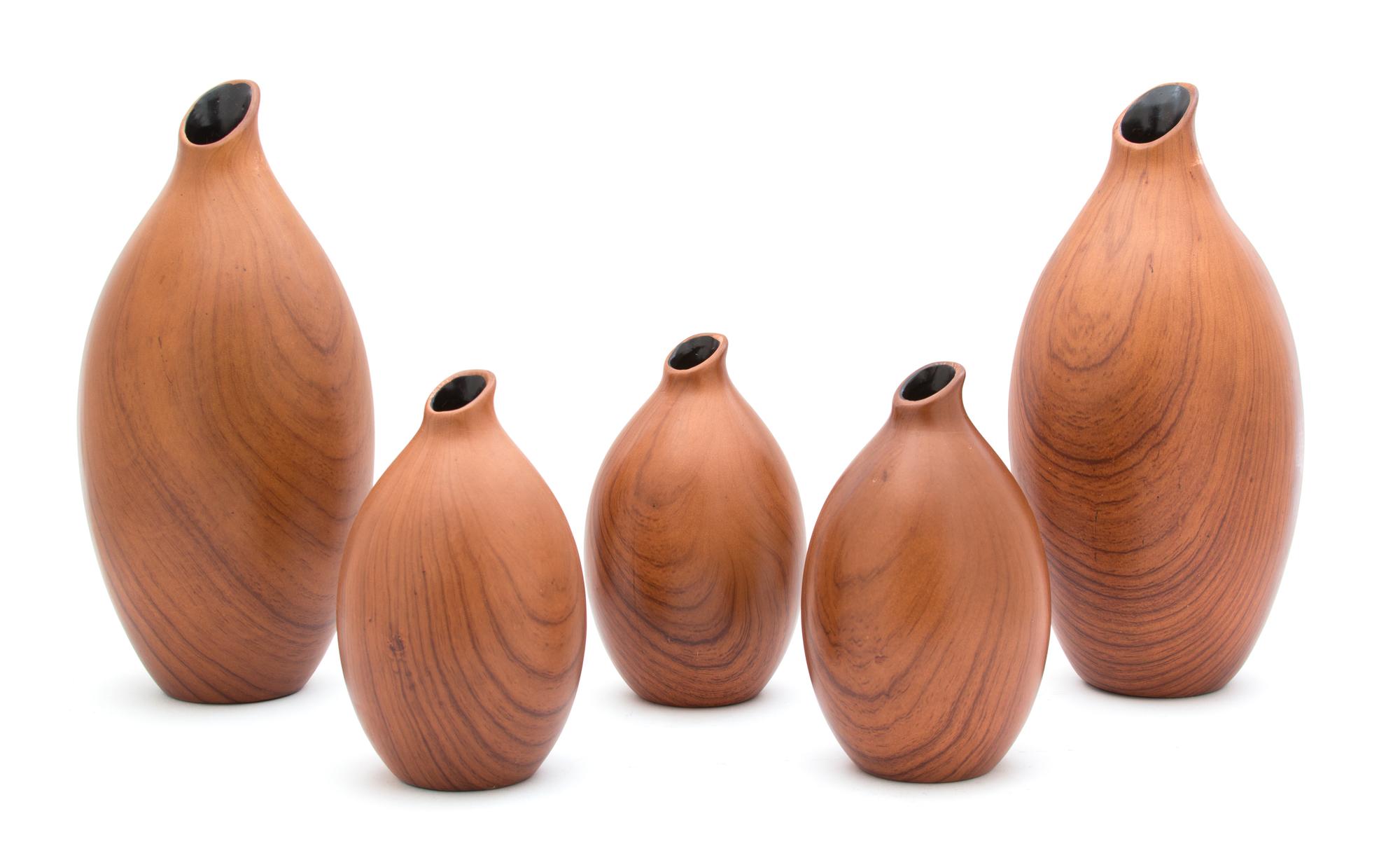 A Set of Five Contemporary Chinese Woodgrain Glazed Porcelain Vases Height of tallest 12 inches. — 20TH CENTURY