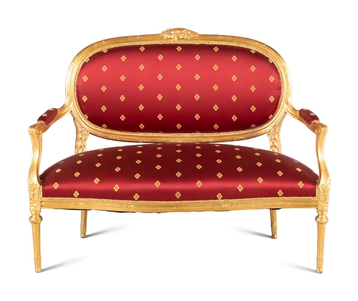 A Louis XVI Style Giltwood Four-Piece Salon Suite