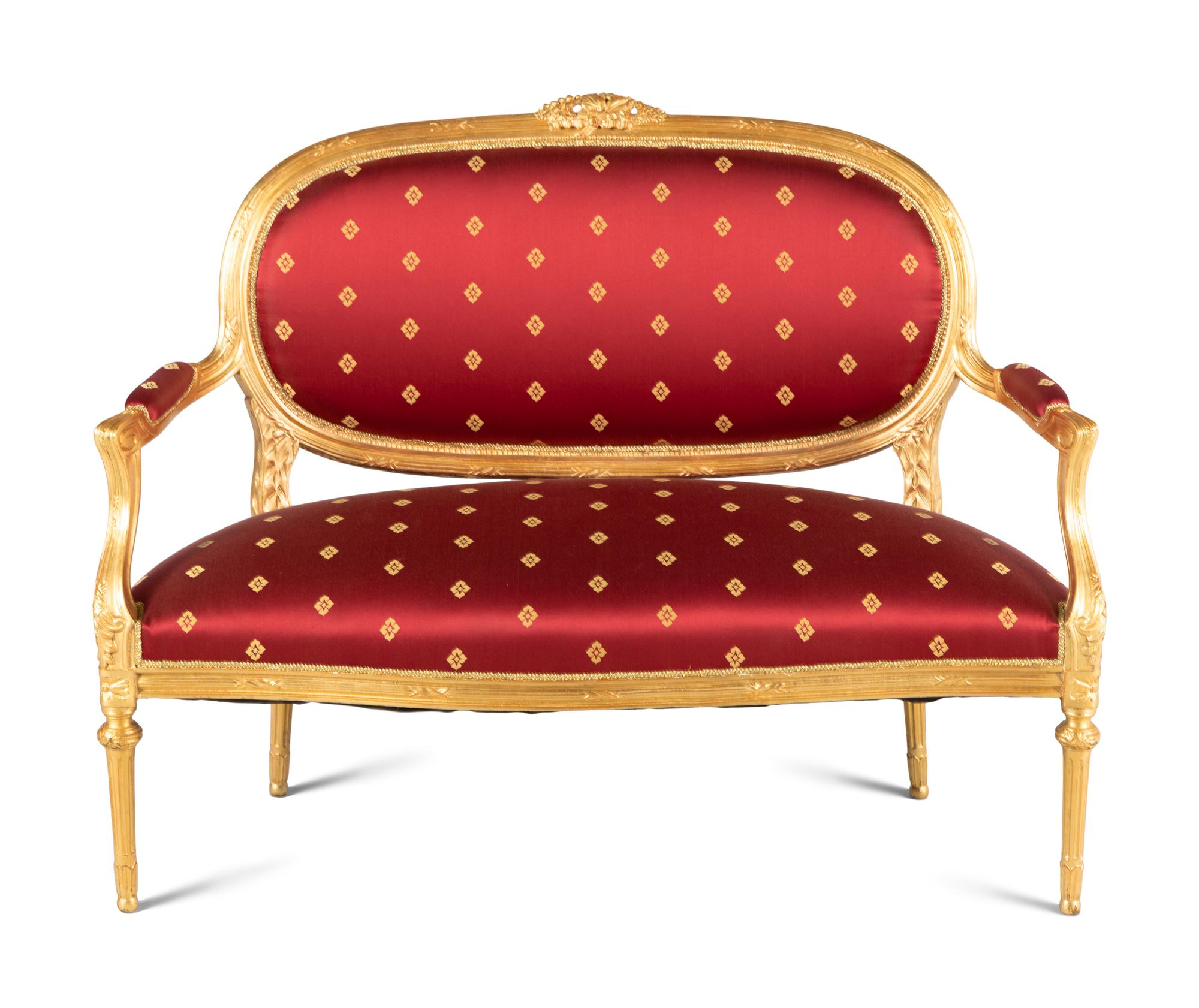 A Louis XVI Style Giltwood Four-Piece Salon Suite